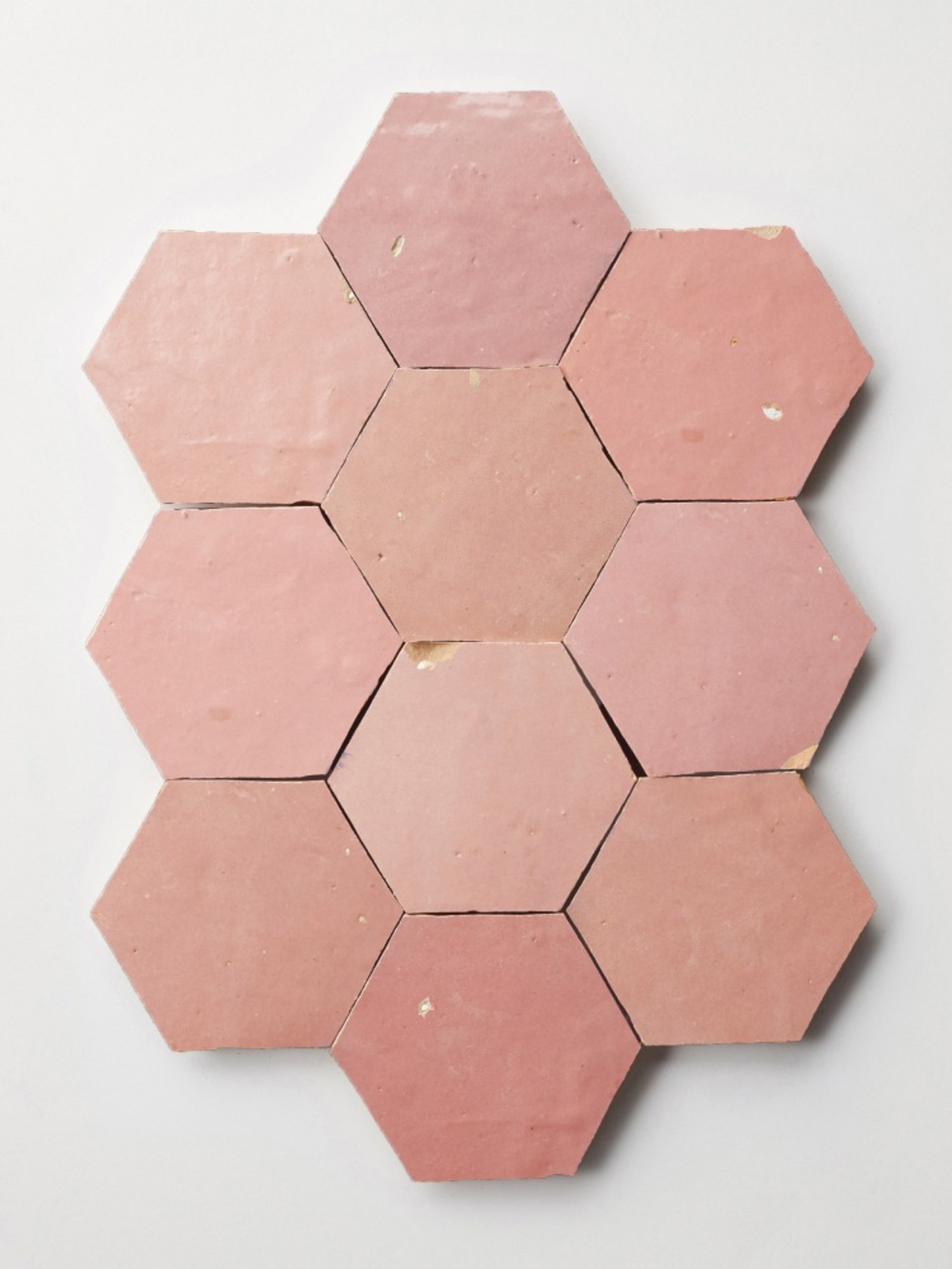 pink hexagon tiles on a white background.