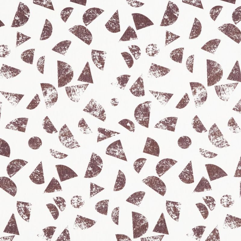 Distressed brown geometric shapes (half-circles, triangles, circles) stamped repeatedlyâ€”scattered across a white backgroundâ€”creating a loose, random repeating pattern with worn, textured prints.