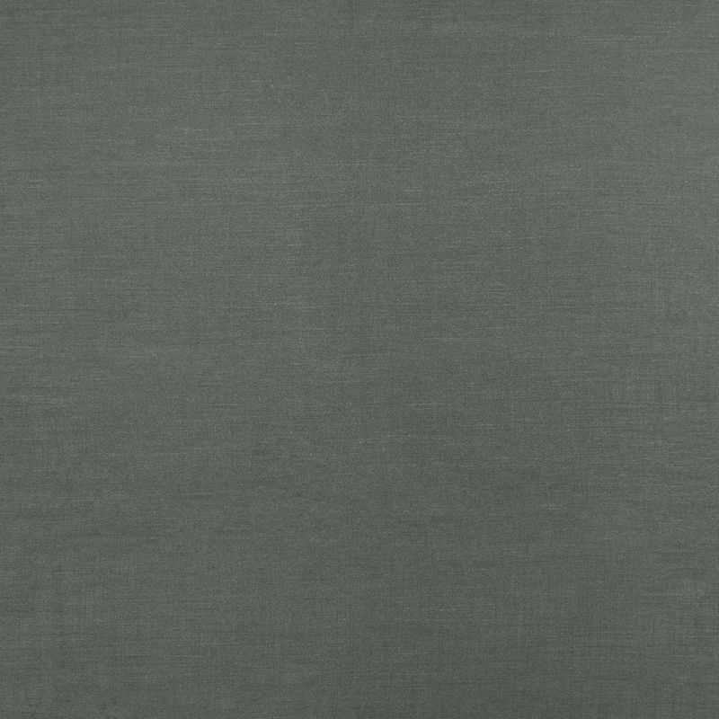 Dark gray woven fabric roller blind, fully lowered and smooth; filtering light and blocking view; fills the frame with uniform texture under neutral indoor lighting, no other room features visible.