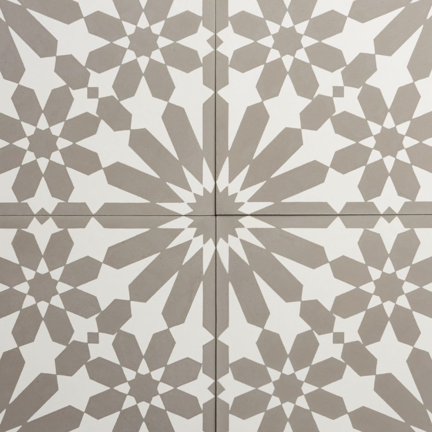 a set of tiles with geometric designs in grey and white.