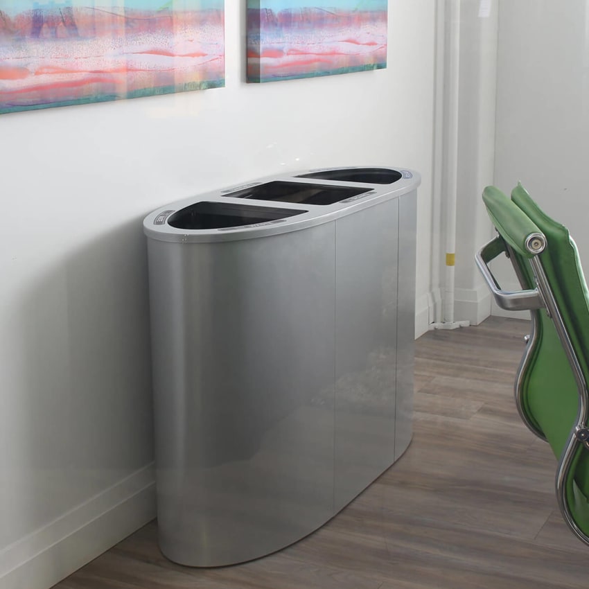 indoor powder coated steel triple stream waste and recycling container in a modern office
