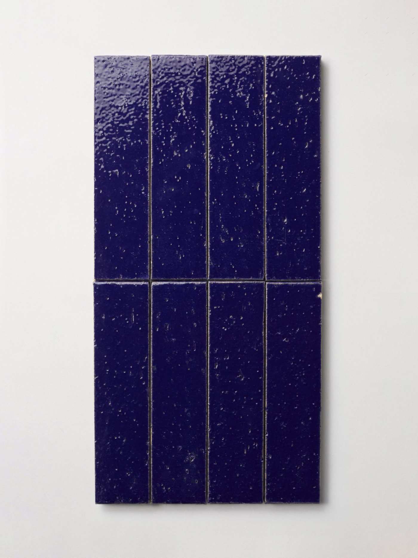 6 blue tiles on a white background.