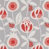 Wallpaper of stylized red-and-white pomegranate-like flowers and leaves, repeating across a textured grey surface; close-up crop with even studio lighting, no surrounding room visible.