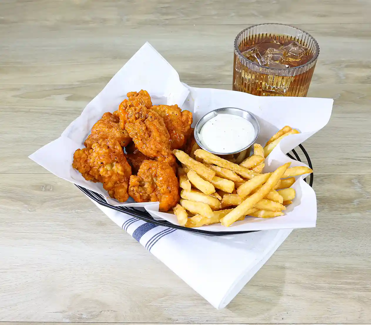 Tyson® Uncooked Chicken Breast Chunk Fritters with Buttery Buffalo Style Sauce Packets_image_1