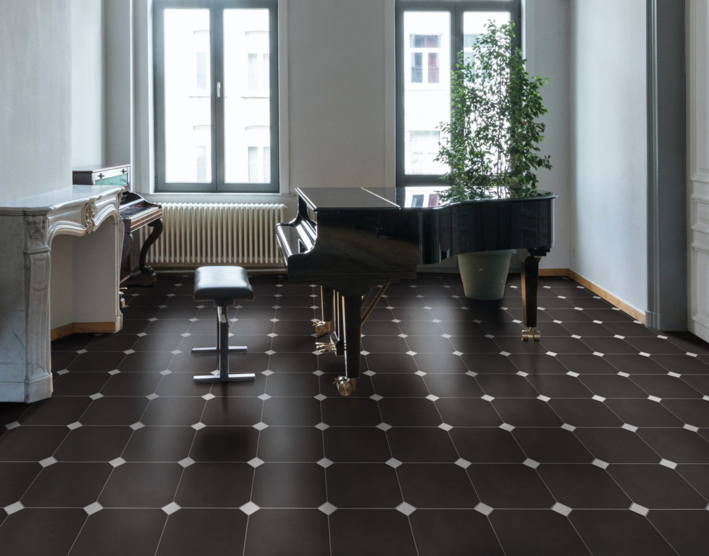 a room with a piano and black and white tiles.