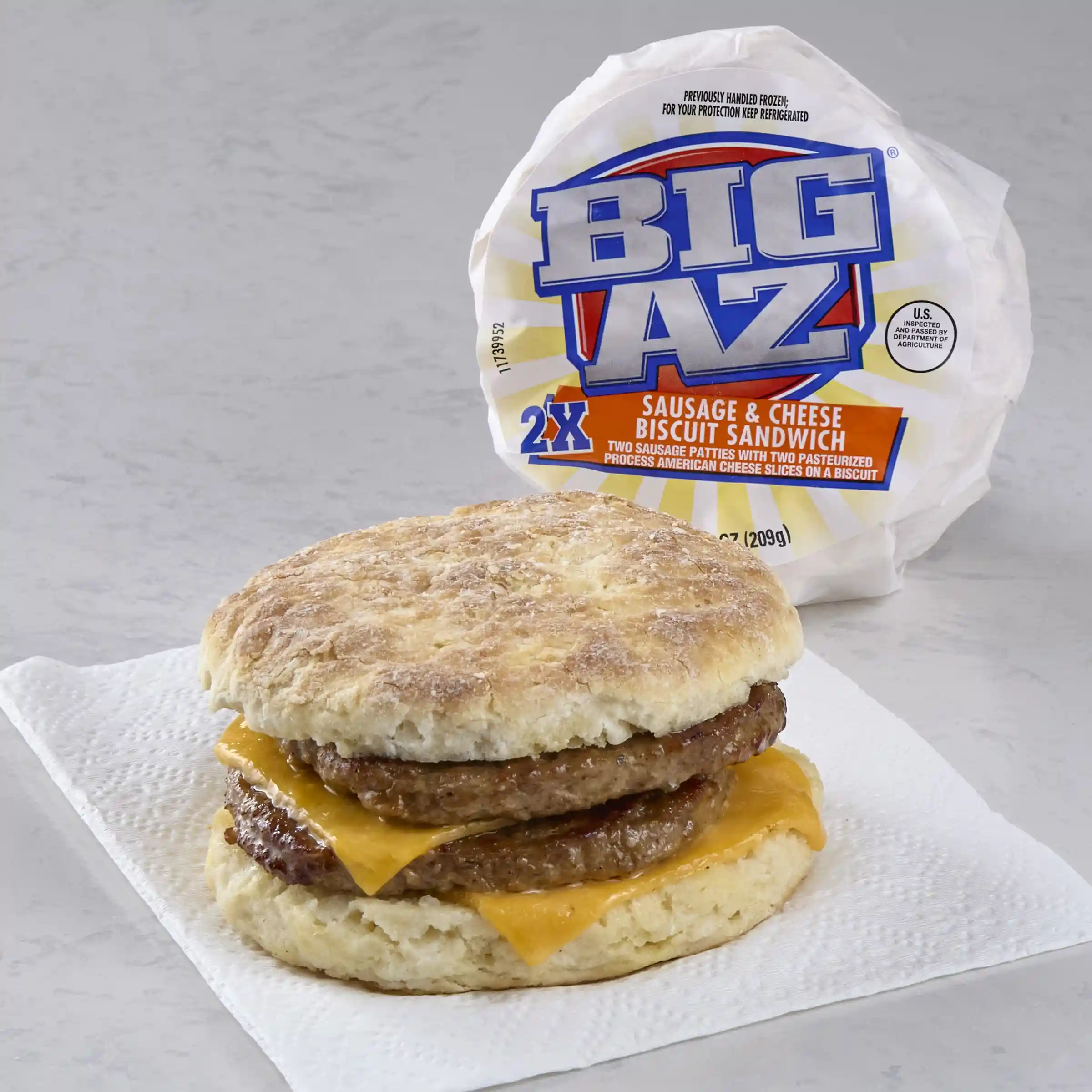 BIG AZ® Double Sausage and Cheese Biscuit Sandwich https://images.salsify.com/image/upload/s--oTodWWR_--/q_25/jv9tqgzljp2i08ecpffb.webp