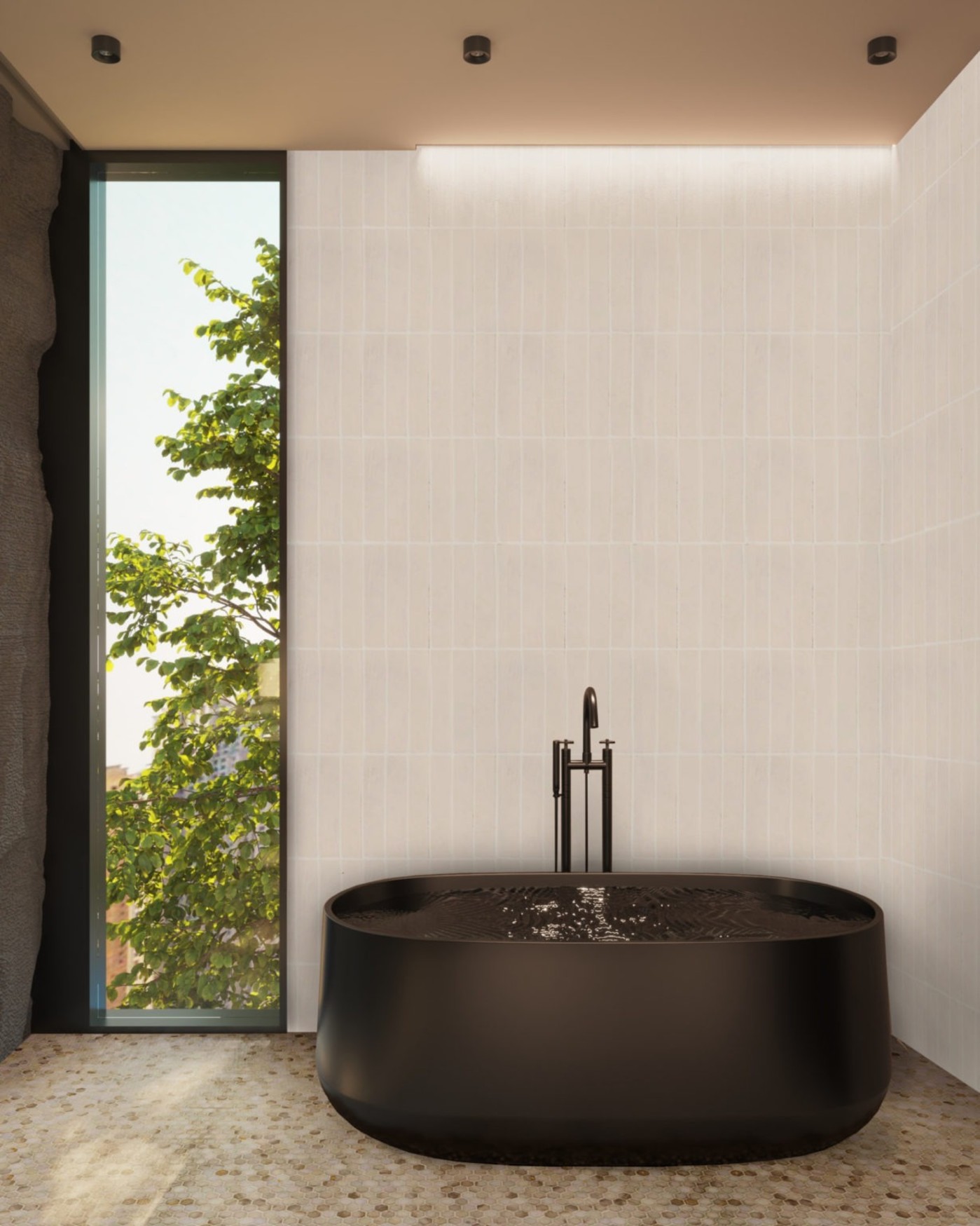 a bathroom with a black tub and a window.