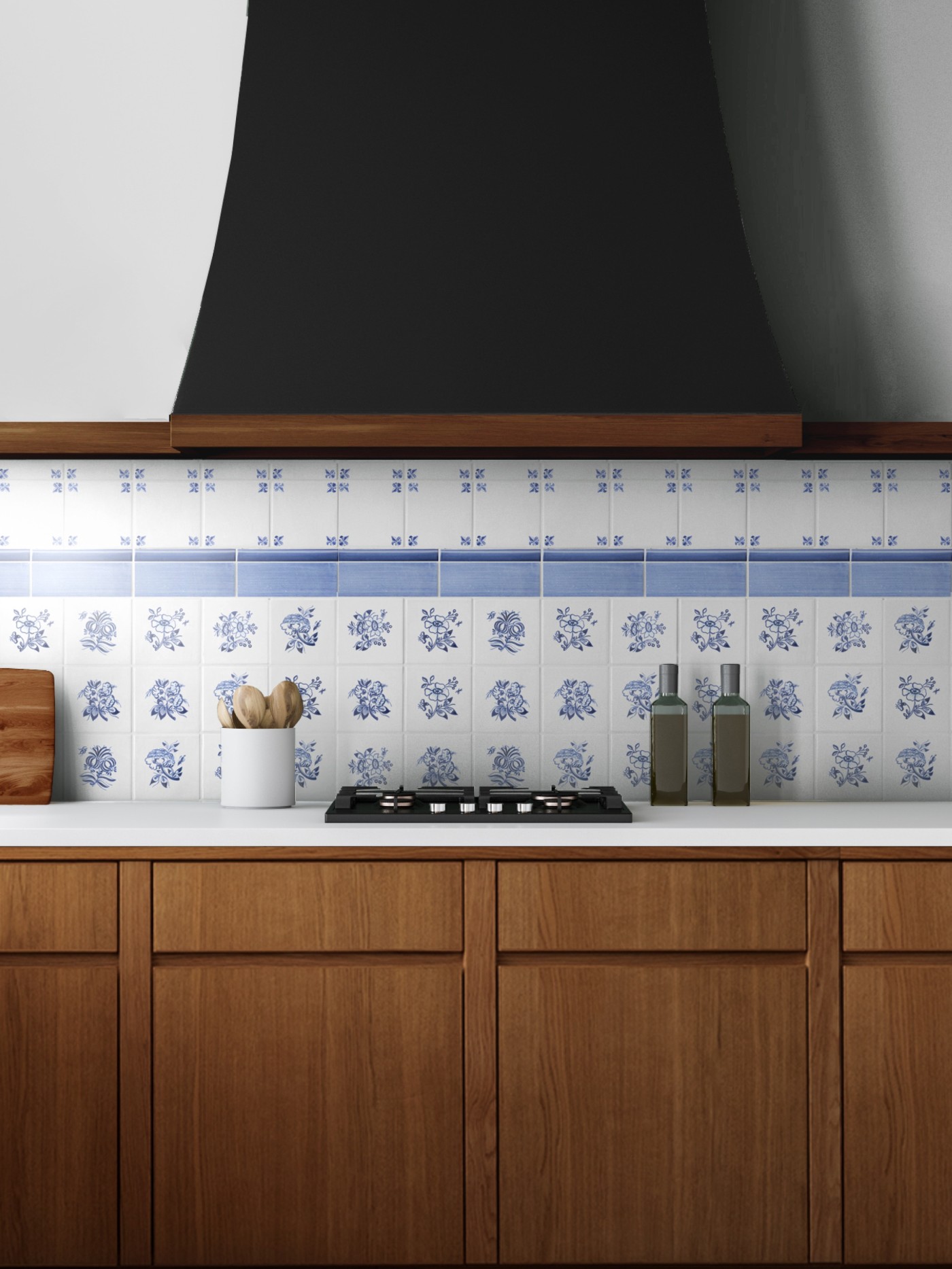 a blue and white tiled stove backsplash in a kitchen with wooden cabinets.