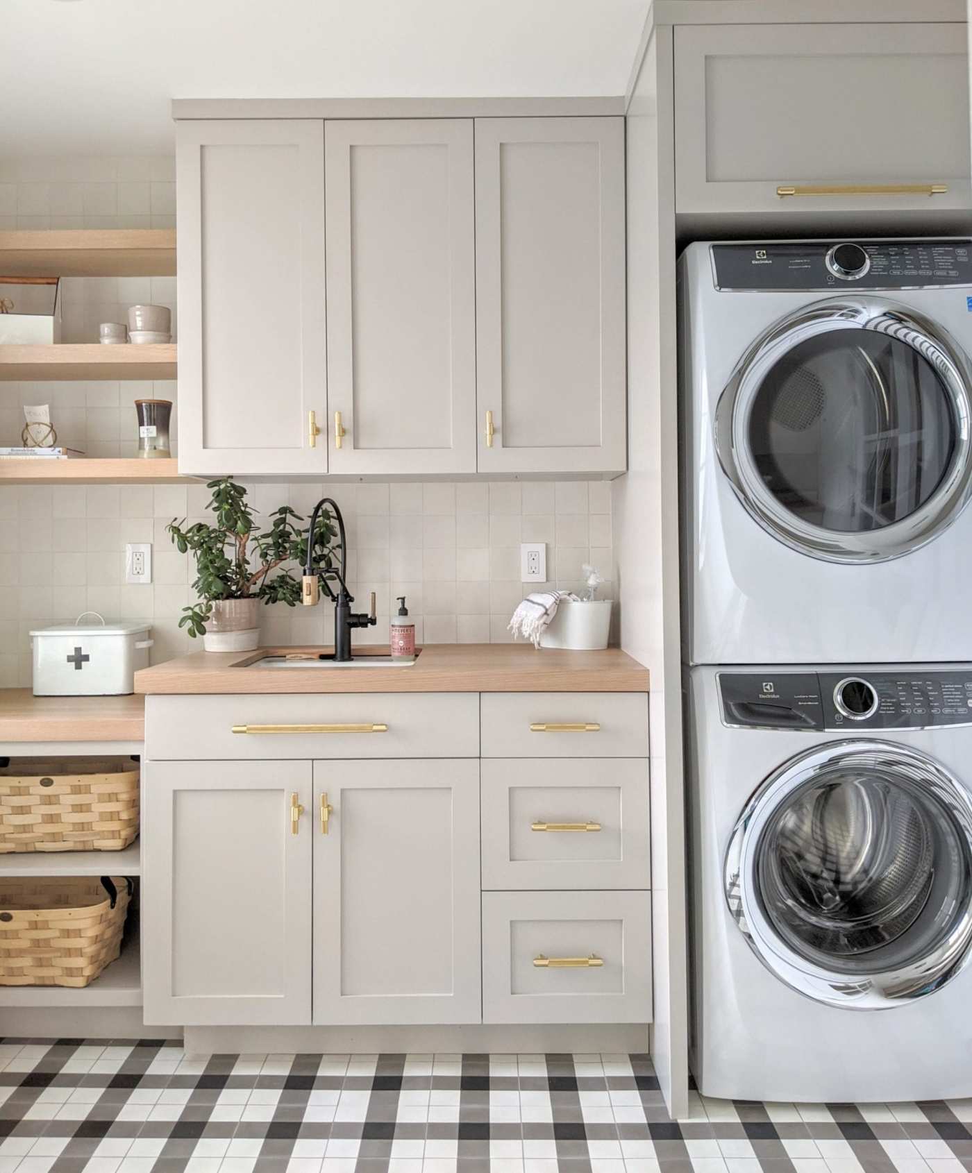 a laundry room with a washer and dryer.