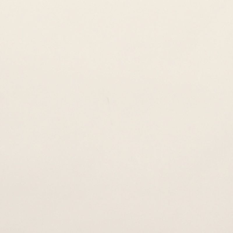 Off-white sheet of textured paper, blank and unmarked, lying flat and evenly lit against a neutral background with soft, diffuse lighting and no visible objects.