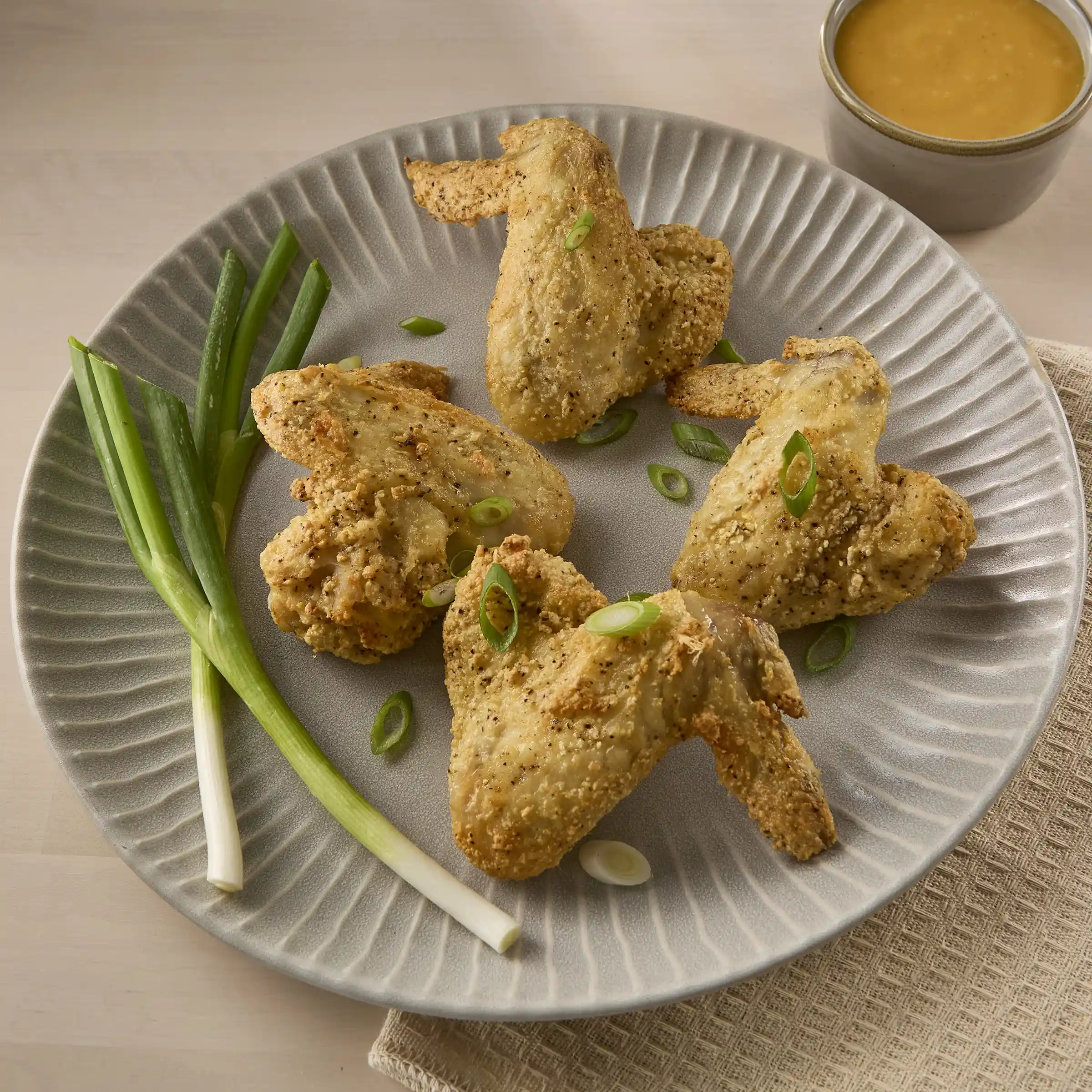 Tyson® Fully Cooked Breaded Bone-In Chicken Wings, Small https://images.salsify.com/image/upload/s--ayjqPE-n--/q_25/b19cfb30465211cc1b7395f255a52d62e4a3dd59.webp