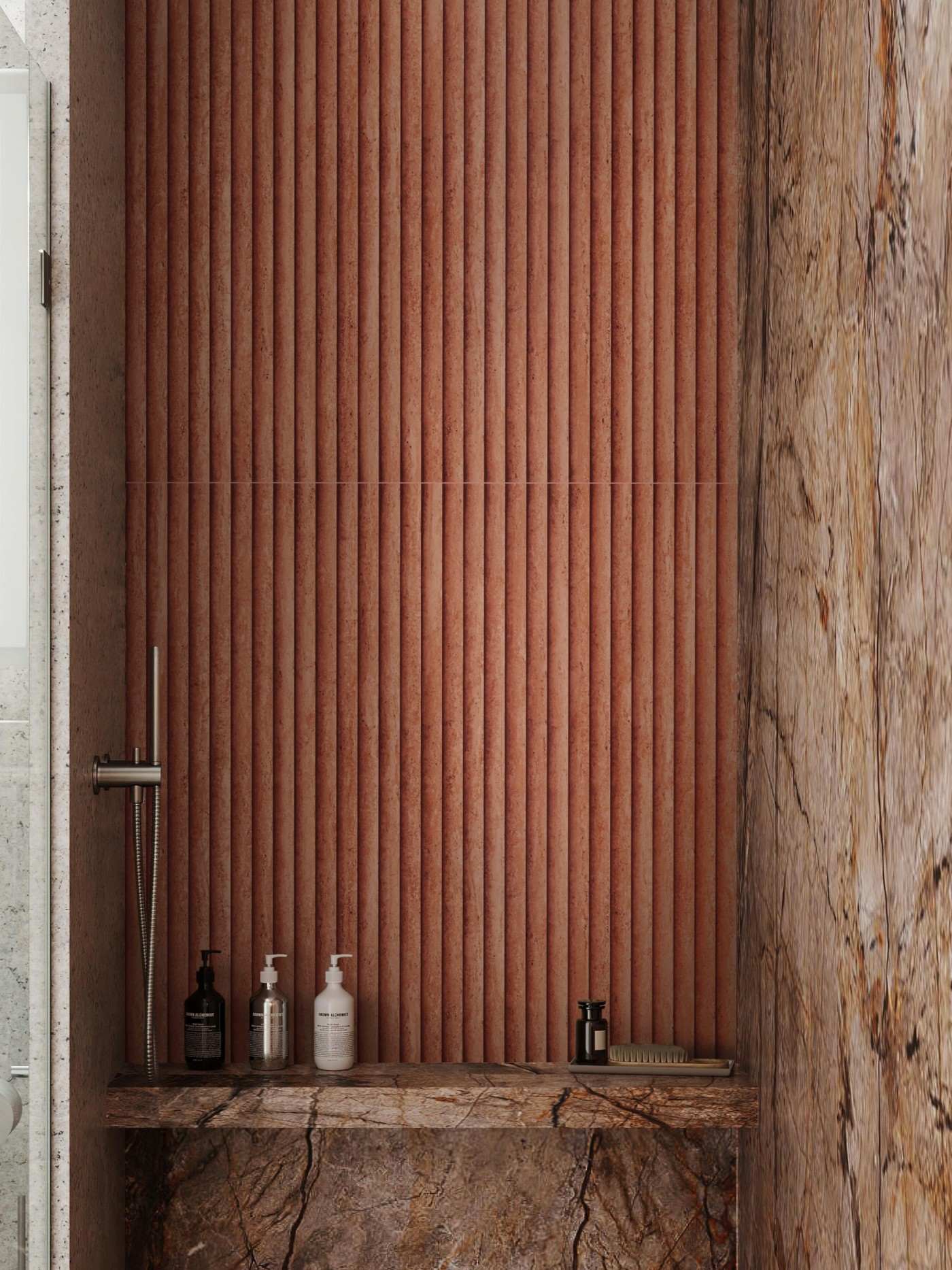 A bathroom wall made of cabochon grand scuplted stone tiles from the Lapidary collection by clÃ© Tile.
