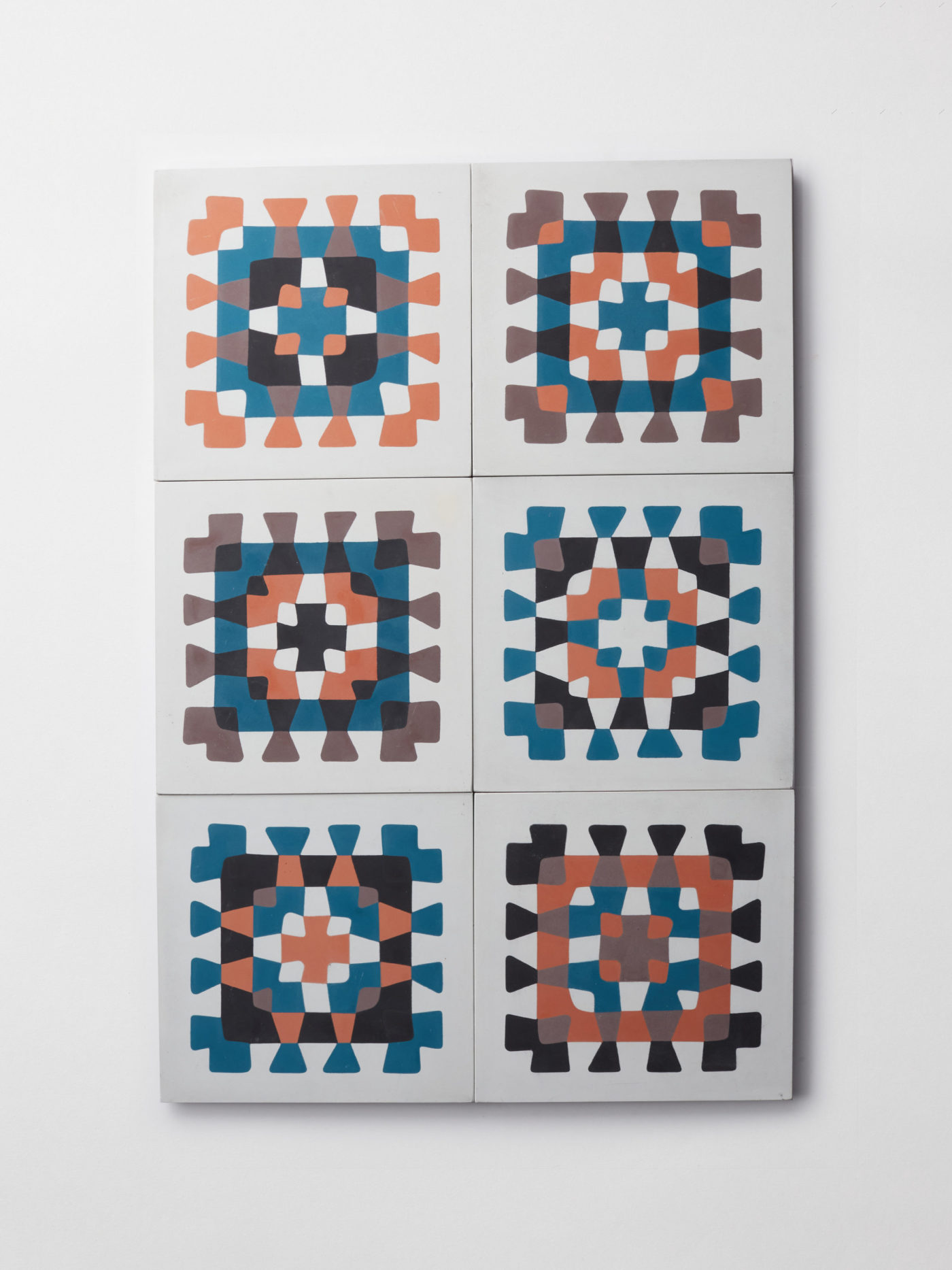 a set of tiles with blue, orange, and brown designs.