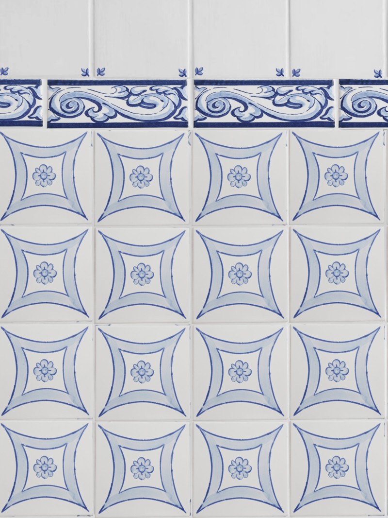 a blue and white tiled wall with designs on it.