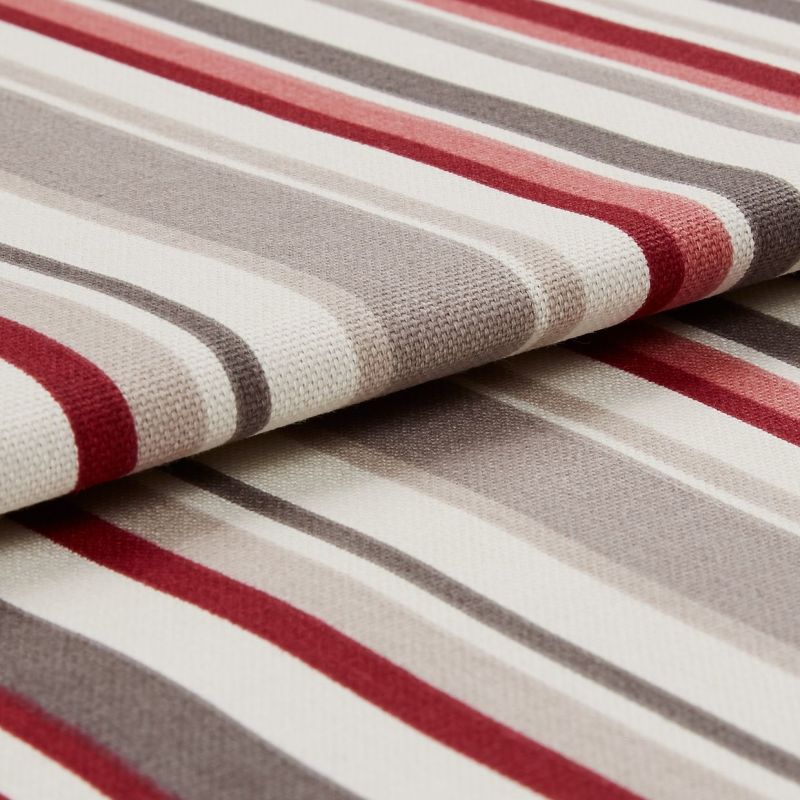 Striped woven fabric folded over itself, featuring red, gray, beige and white horizontal bands; textured knit surface; close-up product-style shot with soft, even lighting and shallow depth of field.