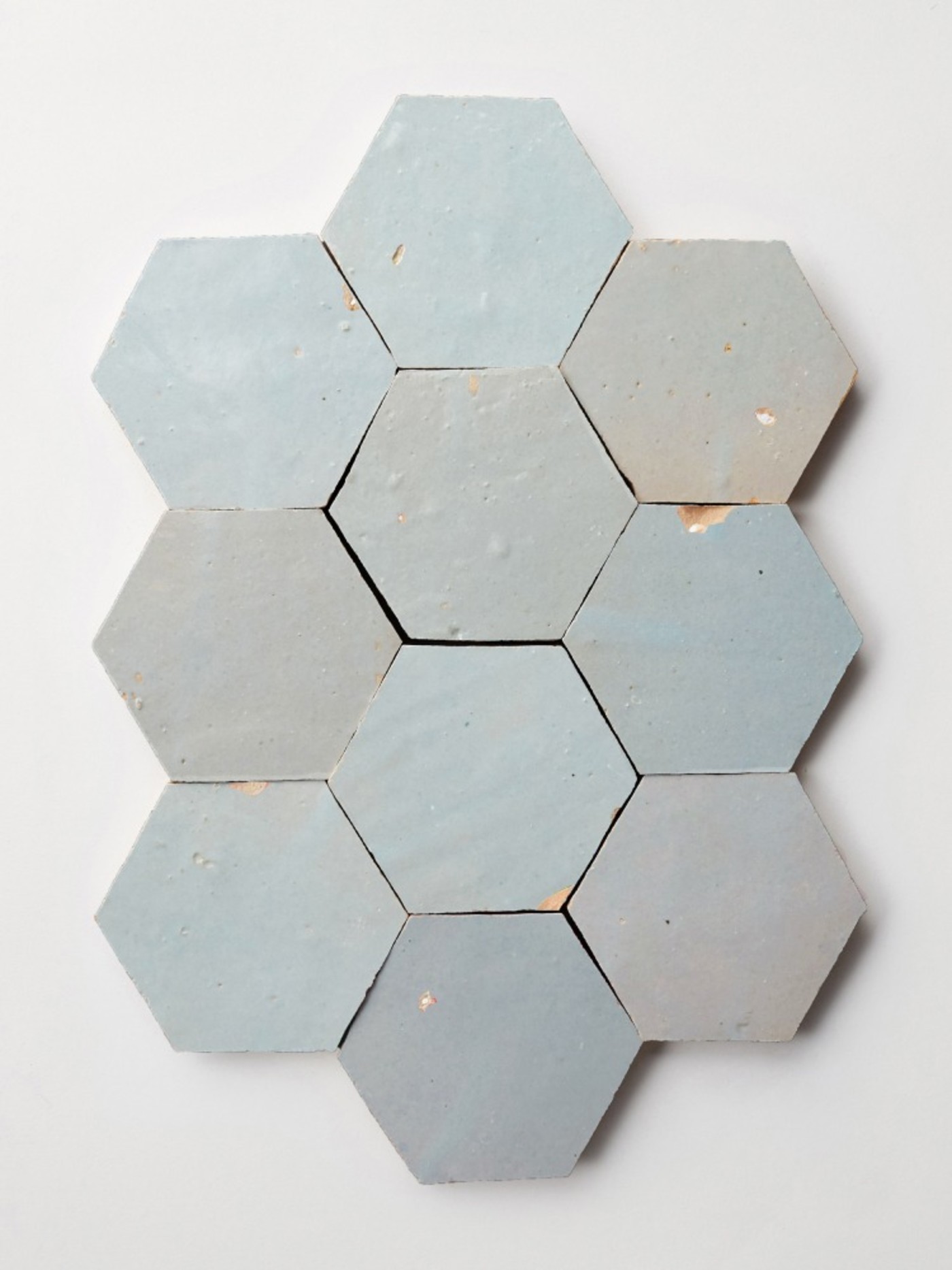 blue hexagon tiles on a white background.