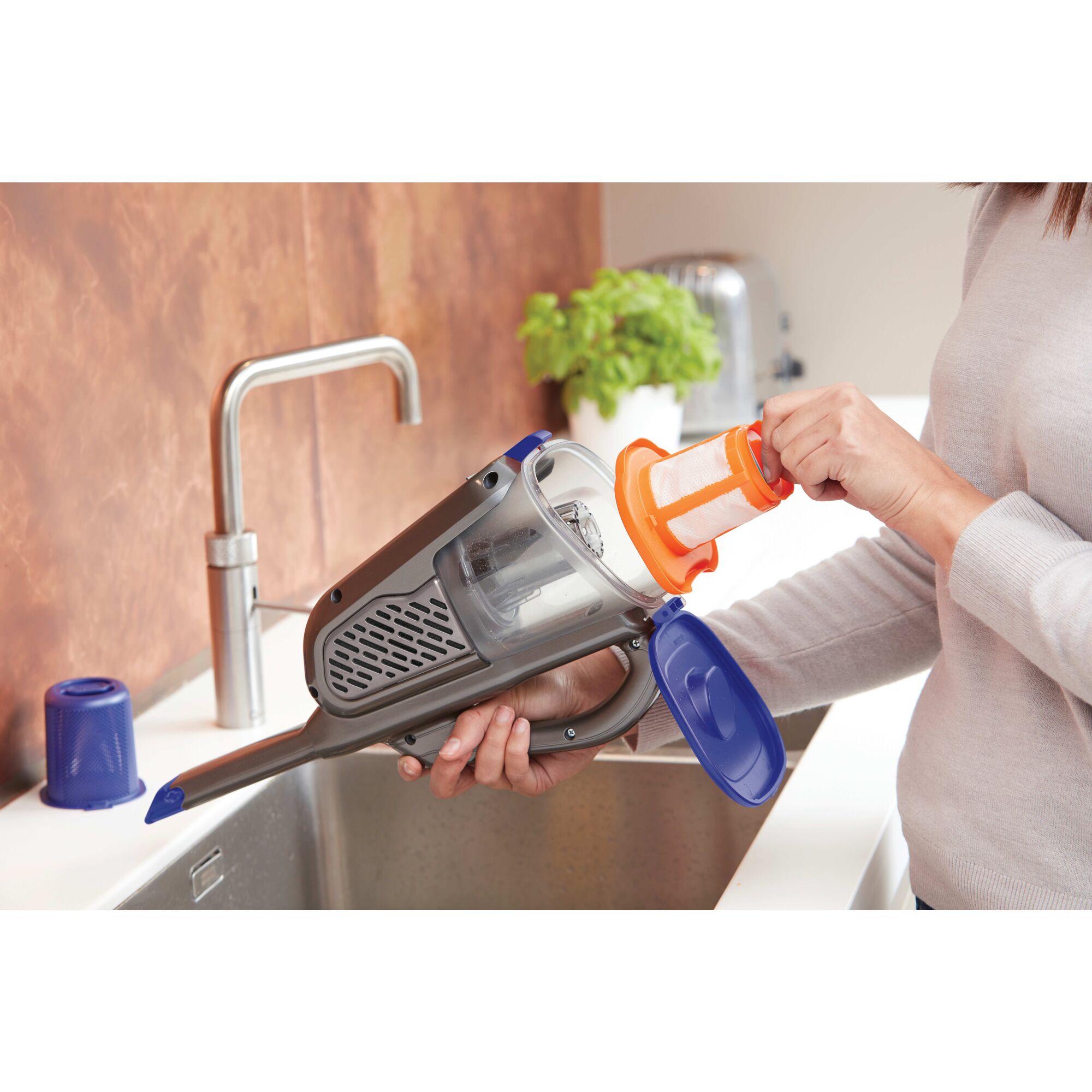 Washable filter feature of 20 volt MAX dustbuster Advanced Clean pet hand vacuum with base charger and extra filter.