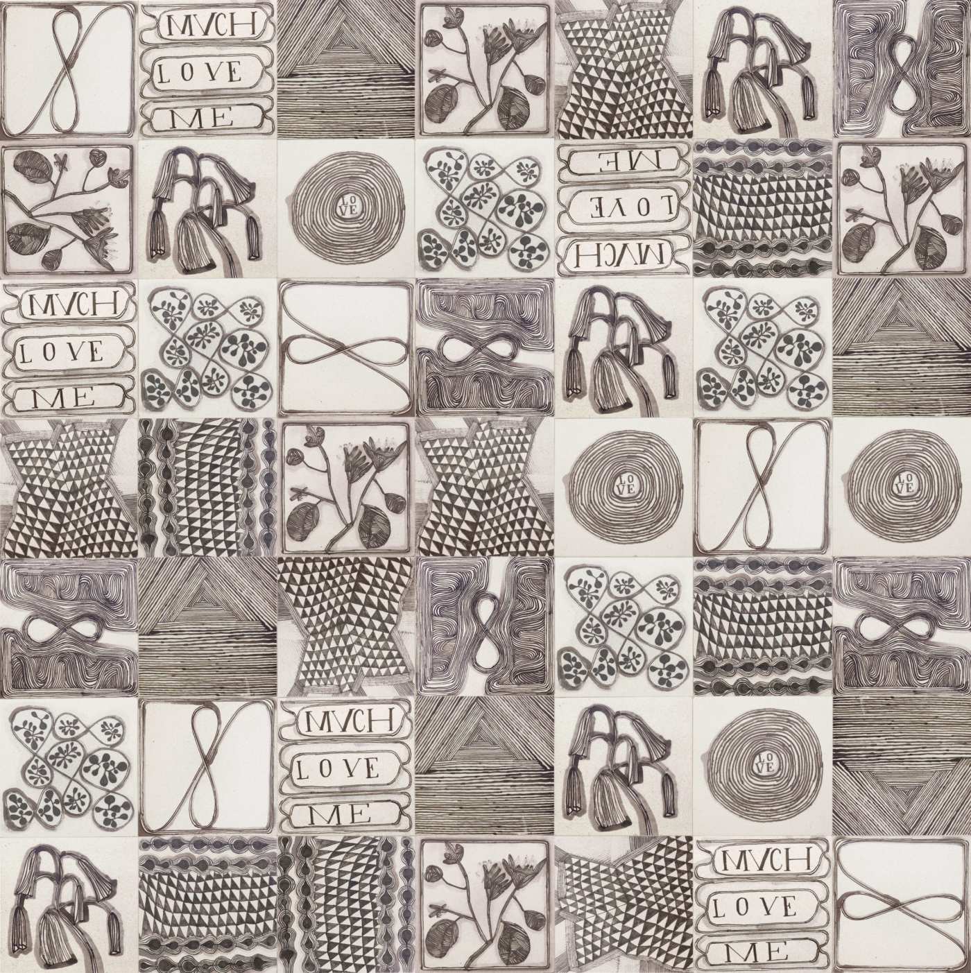 a black and white tile with a variety of designs.