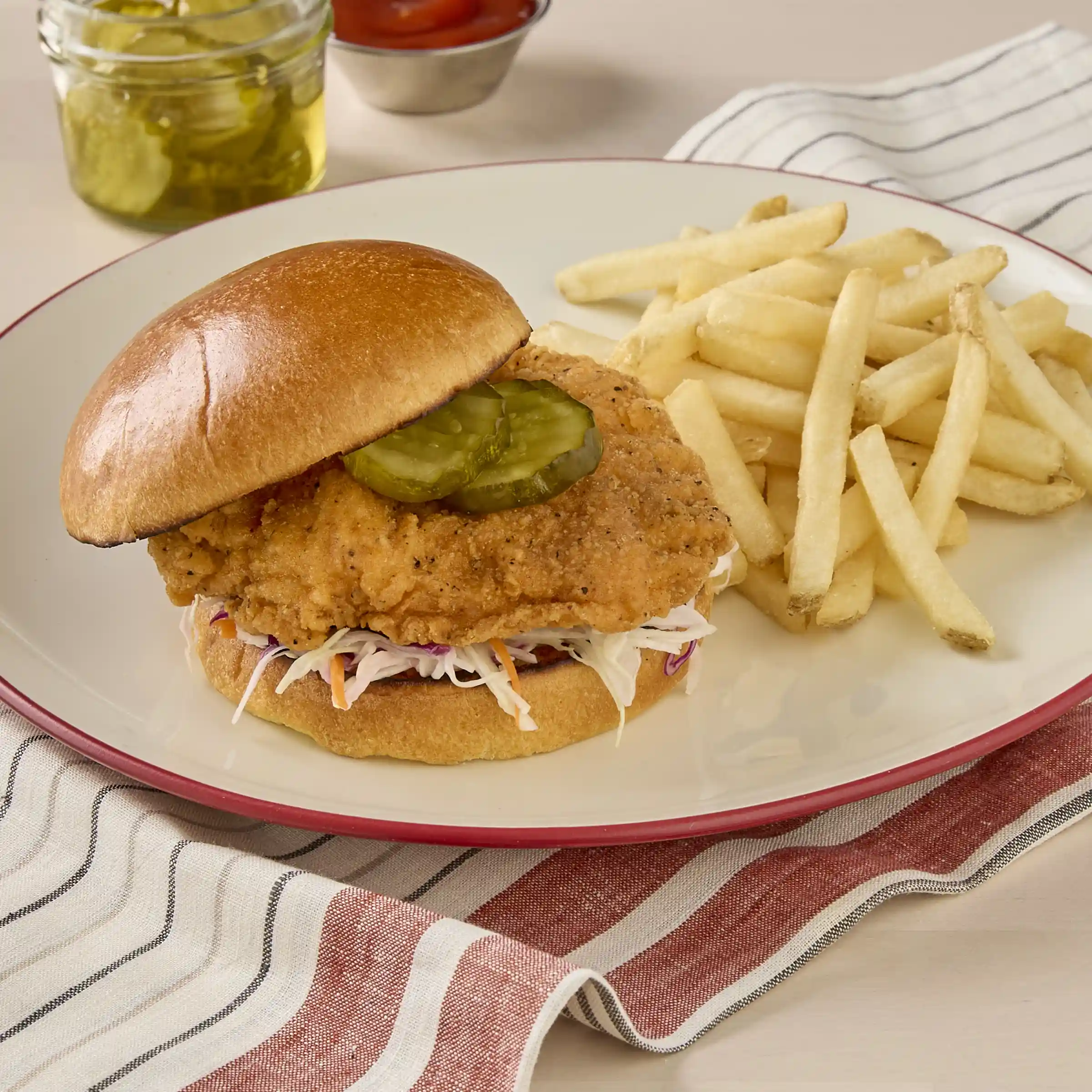 Tyson Red Label® Uncooked Hot & Spicy Chicken Breast Filet Fritters, 4 oz.  https://images.salsify.com/image/upload/s--dQAFuzfc--/q_25/ef9e6feb720f69c97bd7cf76c1864812bc52767e.webp