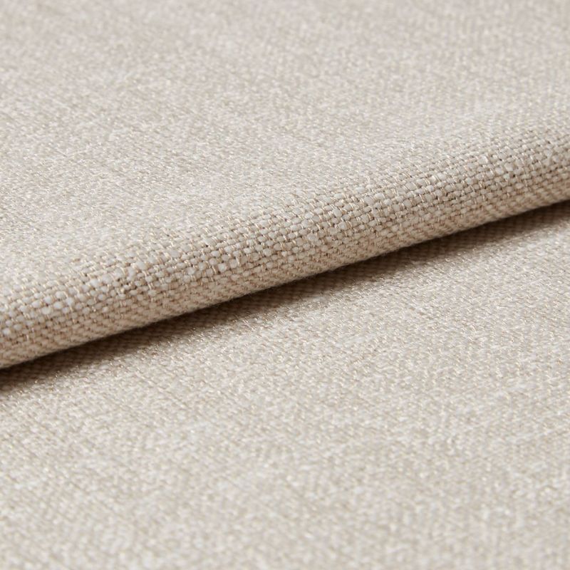 Beige woven fabric with a tight, looped texture, folded over itself; close-up studio view with soft, even lighting highlighting subtle sheen and detailed weave.