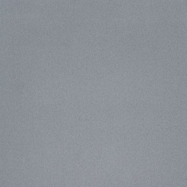 A coarse grey fabric surface (no curtains or blinds), filling the frame; texture appears densely stippled and static, lying flat under even, neutral indoor lighting with no visible context.