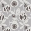 Wallpaper â€” light-gray, matte textured surface patterned with repeating stylized white and dark-gray pomegranate-like flowers and leaves; the motif repeats uniformly, covering a flat interior wall under even lighting.