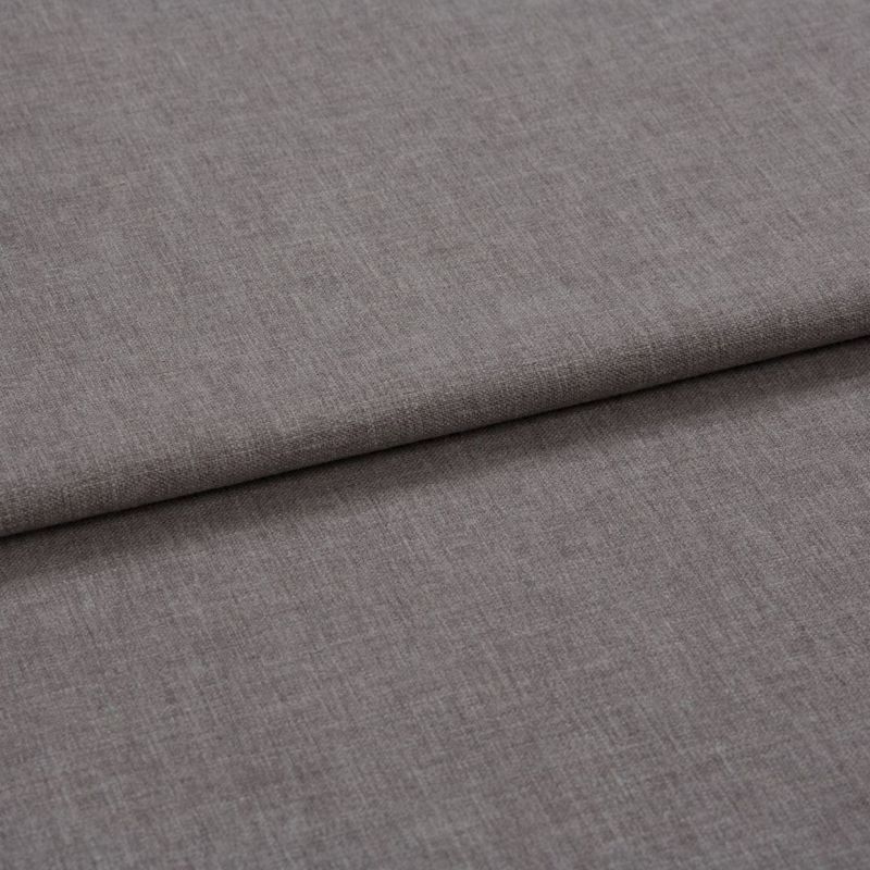 Grey woven fabric panel, folded horizontally with a visible overlapping seam; folded flat and layered, showing fine linen-like texture under soft diffuse lighting in a close-up, neutral setting.