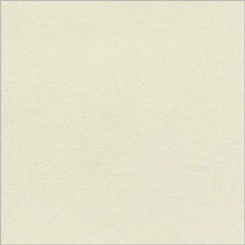 A plain cream-colored textured surface filling the frame — stationary and blank — set in soft, even lighting with no discernible features, edges, or shadows.
