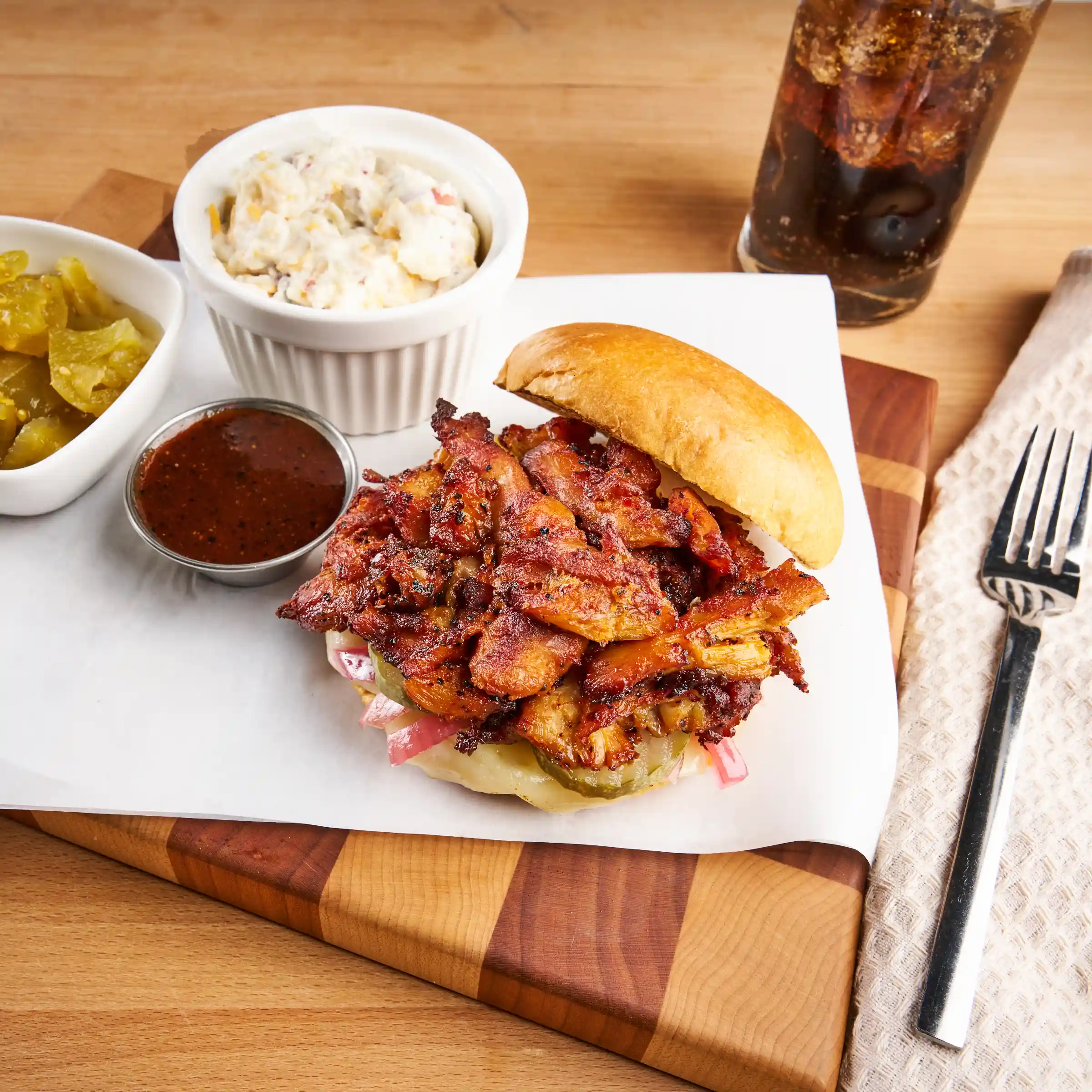 Tyson® Pitmaster Fully Cooked Unbreaded Naturally Smoked Sweet Heat Dry Rub Chicken Thigh Pieces_image_1