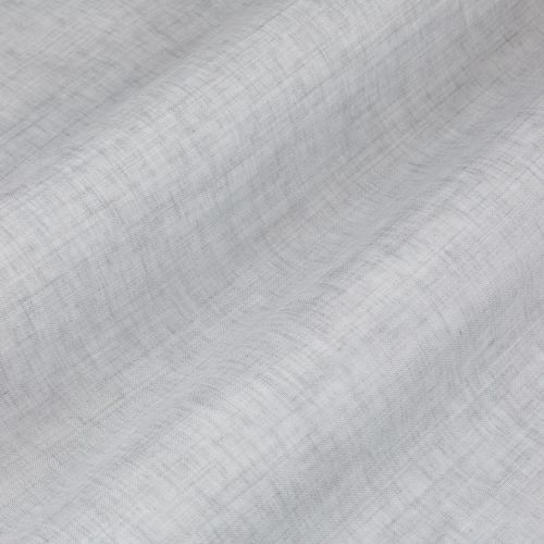 Light gray woven linen curtain, hanging in gentle horizontal folds with visible cross-weave texture; filtering soft, diffuse daylight in a neutral, close-up interior view (no visible window or room features).