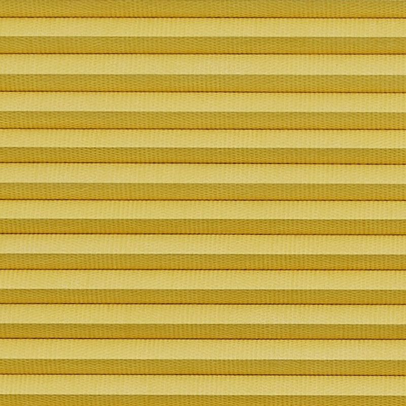 Horizontal cellular (honeycomb) pleated blind, closed with evenly spaced golden-yellow fabric folds and subtle texture; blocking light and insulating, filling the frame under warm diffuse lighting.