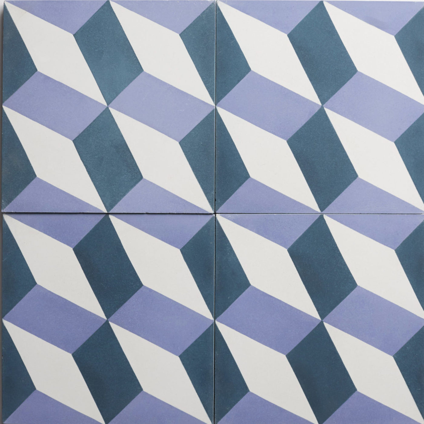 a set of tiles with blue and white geometric designs.