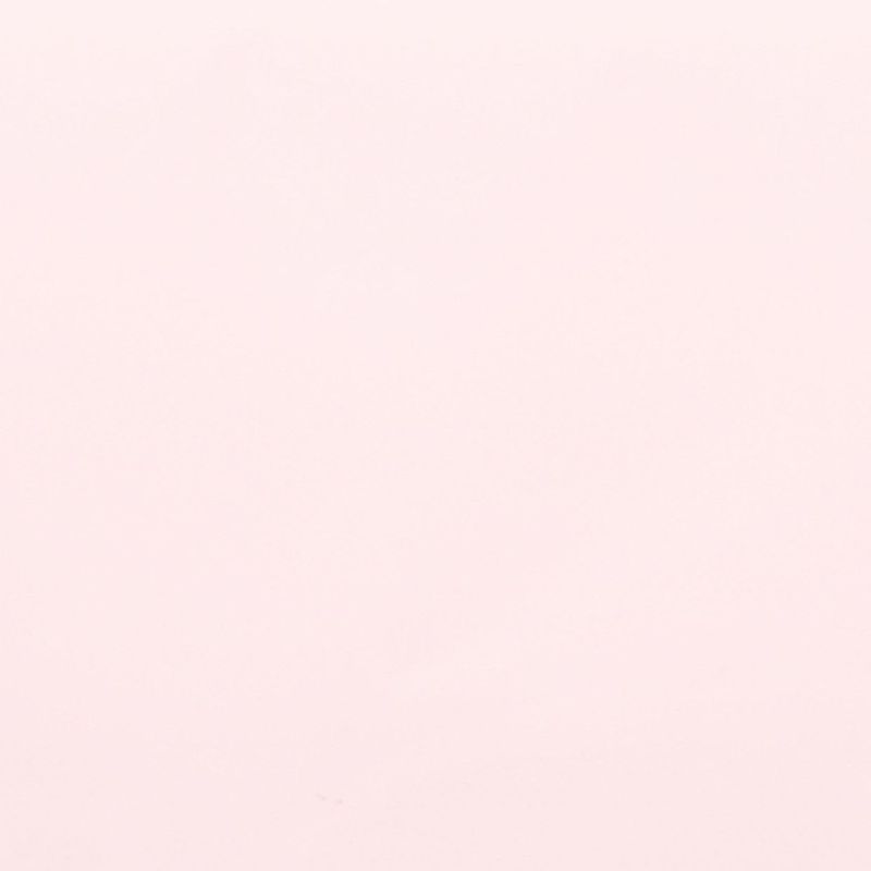 Blank pale pink painted wall, smooth and subtly textured, fills the entire frame with even, diffuse lighting, showing no windows, furniture, or other visible features.