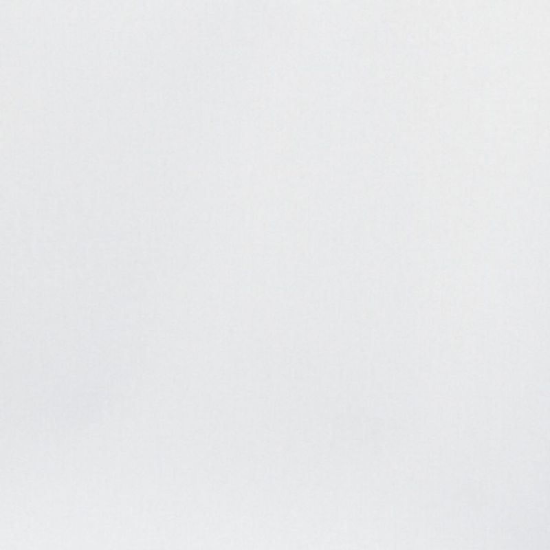 White textured paper fills the frame, resting flat and unmarked, evenly lit with soft diffuse light in a neutral, featureless setting.