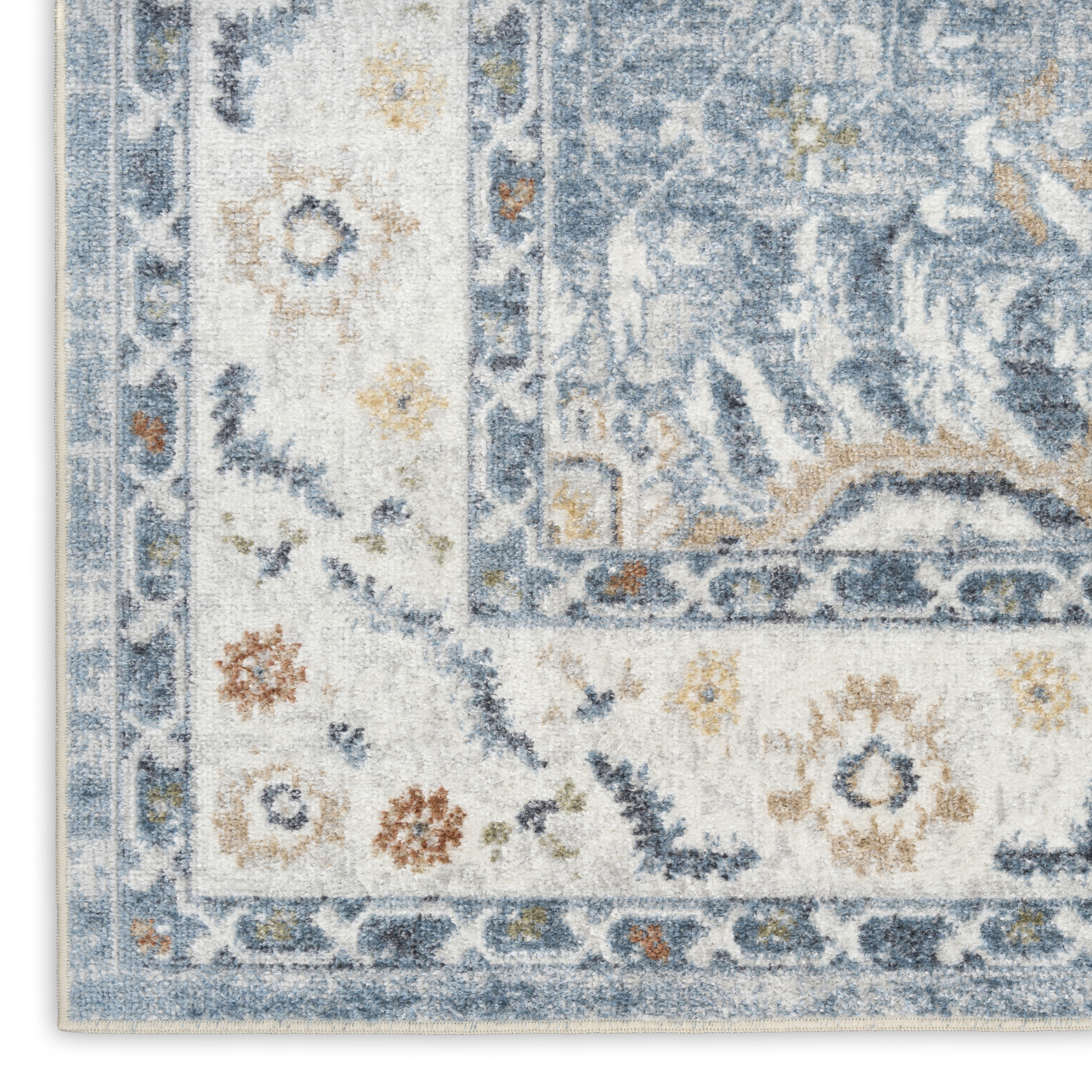 Nourison Astra Machine Washable 6'7" x 9' Blue Vintage Indoor Rug