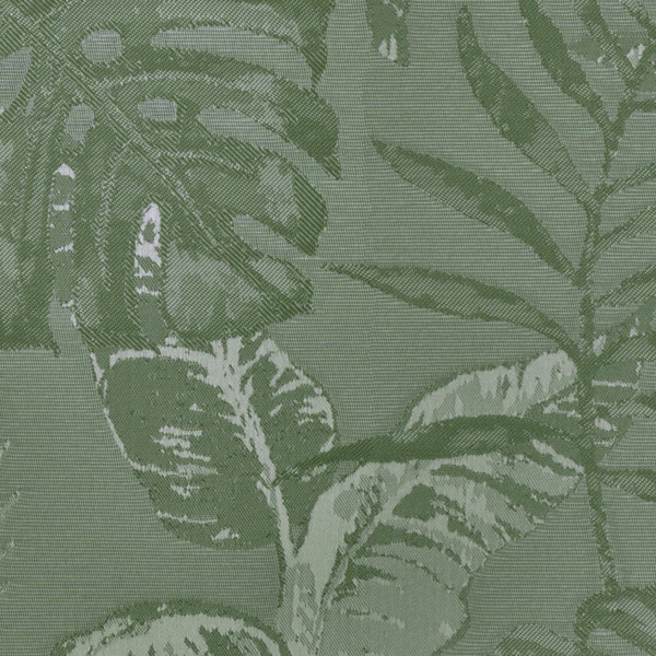 Large tropical leaves overlap and fan outward, printed in darker green tones with subtle highlights on a textured sage-green woven fabric background, forming a repeating botanical pattern.