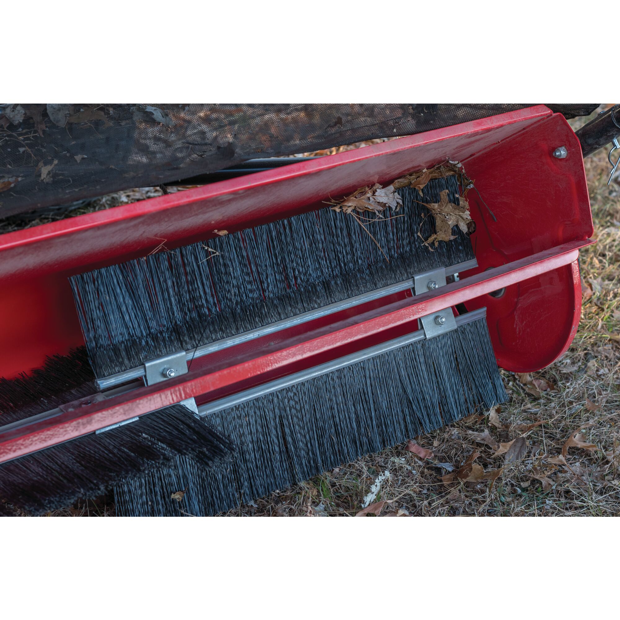Efficient sweeping feature of 42 inch high speed lawn sweeper.