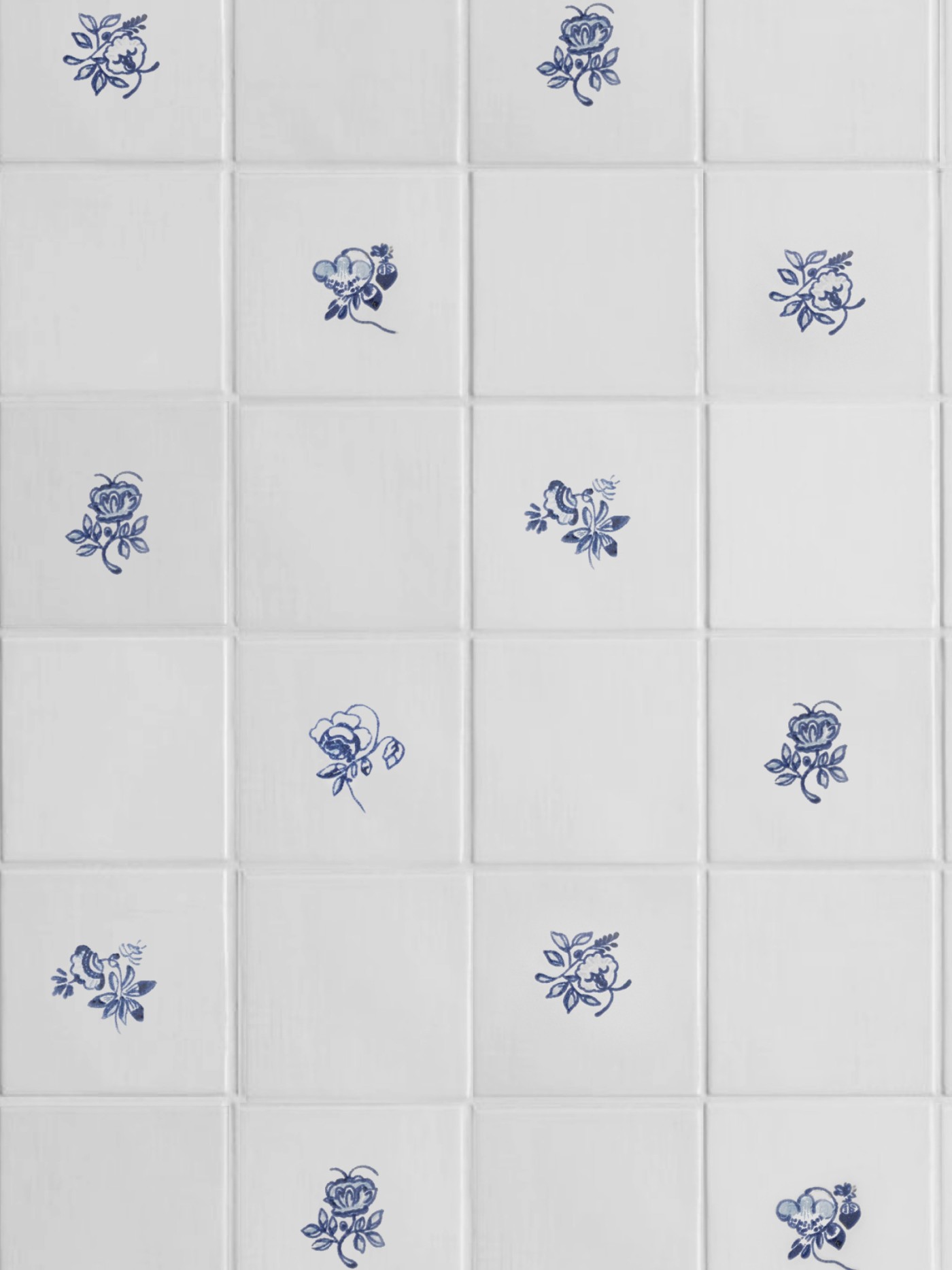 blue and white tiles with hand painted floral designs.