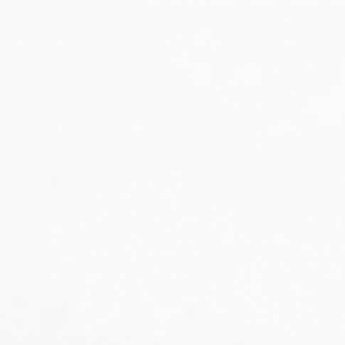 White textured sheet fills the frame, lying flat and blank; subtle paper grain visible, evenly lit with soft shadows, creating a neutral, minimal background.