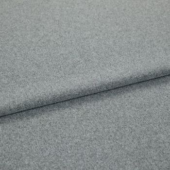 Grey, fine-textured upholstery fabric folded in overlapping layers; tightly woven, slightly napped surface. Close-up view on a flat, neutral background with soft, even lighting emphasizing texture.