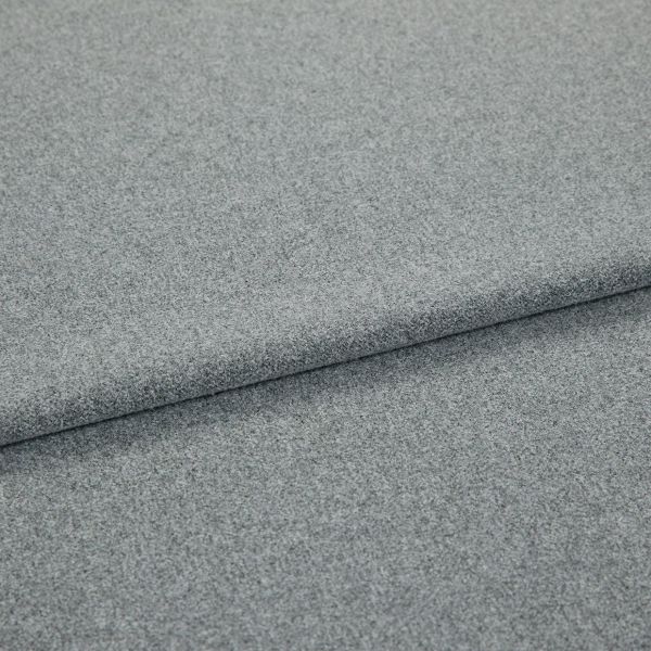 Grey, fine-textured upholstery fabric folded in overlapping layers; tightly woven, slightly napped surface. Close-up view on a flat, neutral background with soft, even lighting emphasizing texture.