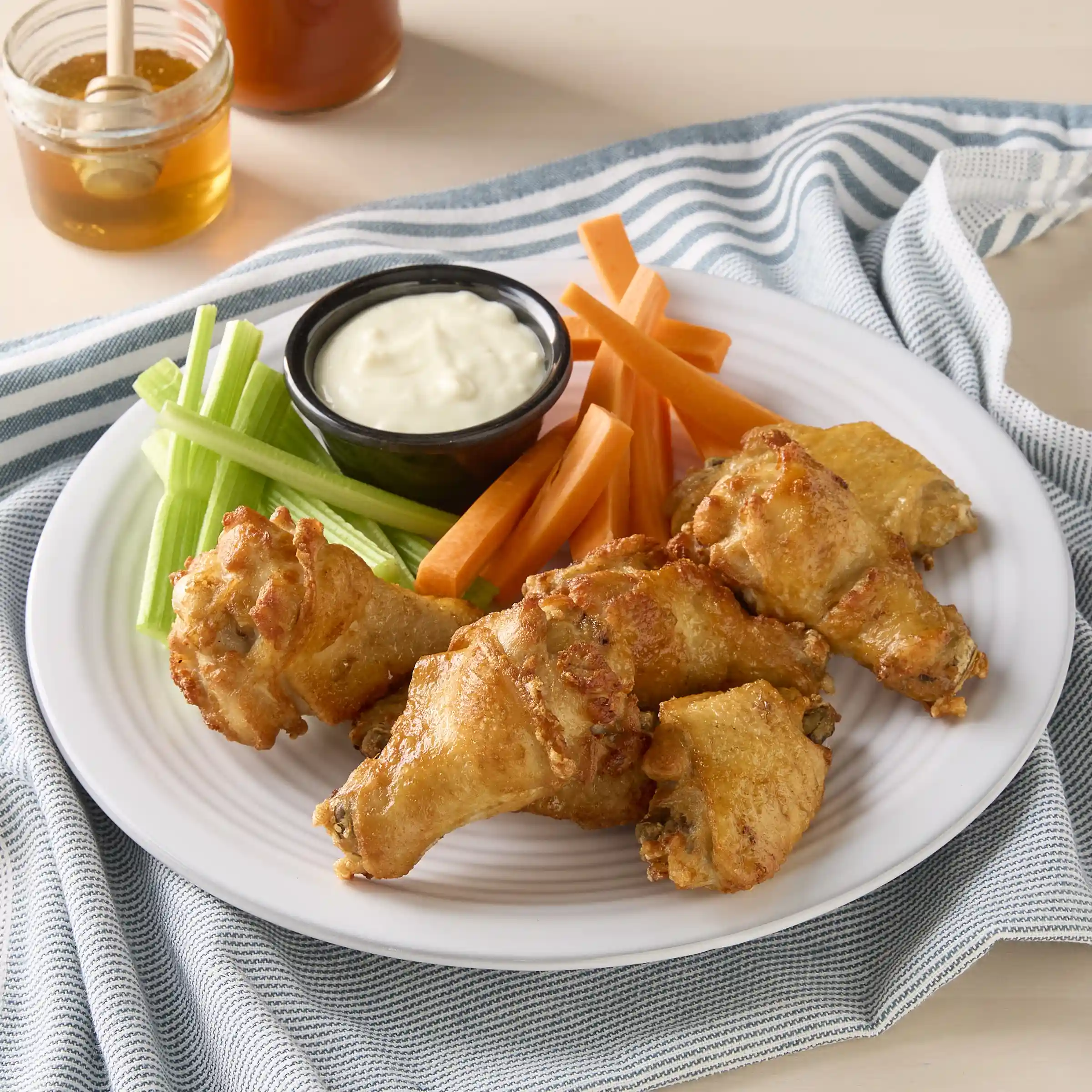 Tyson® Fast Finish® Fully Cooked Coated Bone-In Chicken Wing Sections, Jumbo https://images.salsify.com/image/upload/s--iNQz7Ogf--/q_25/a68506442c9dcaae6cc60b6e3f03b900058d57bd.webp