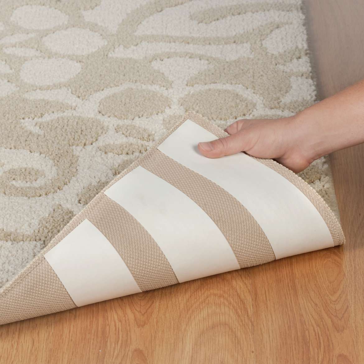 How To Hold Rugs In Place