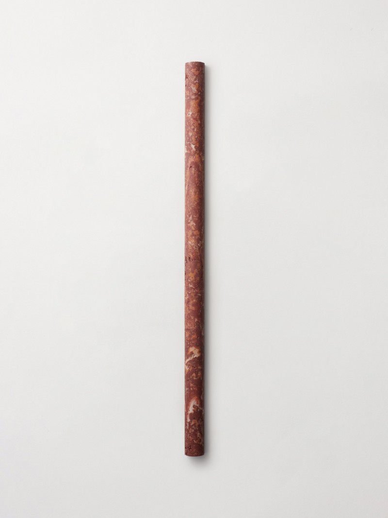 a red marble pencil on a white background.