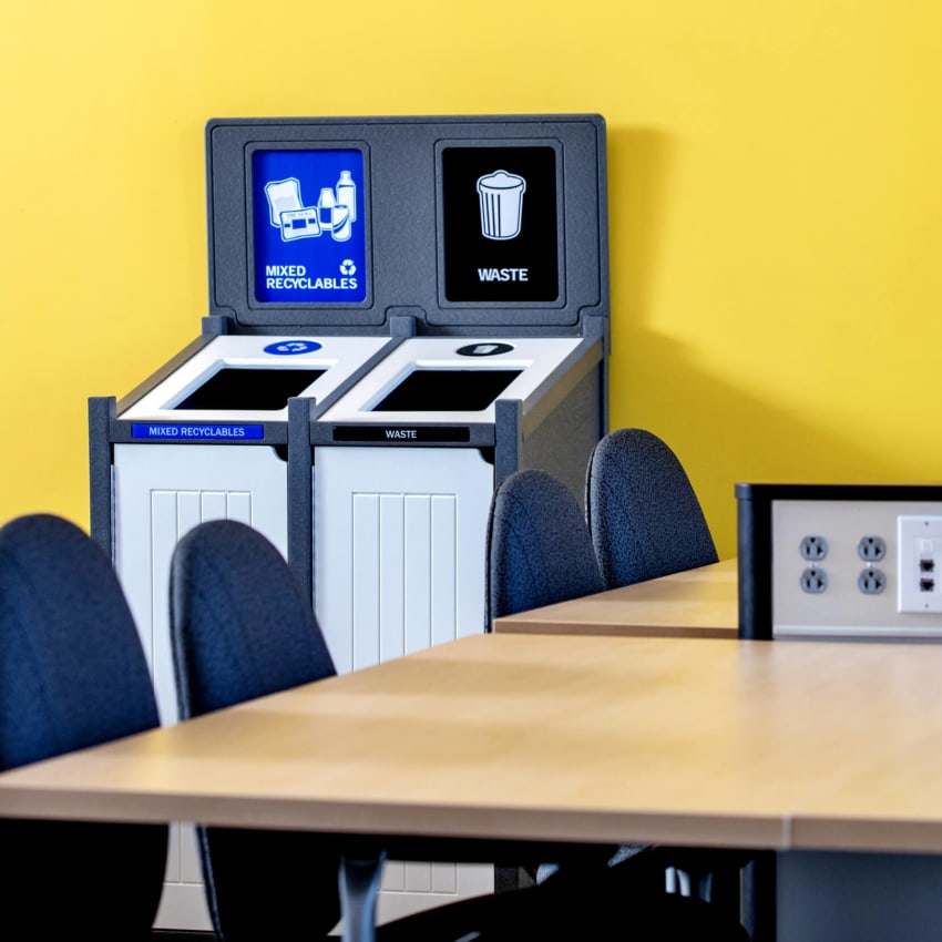 mixed recyclables and waste bin in a college classroom