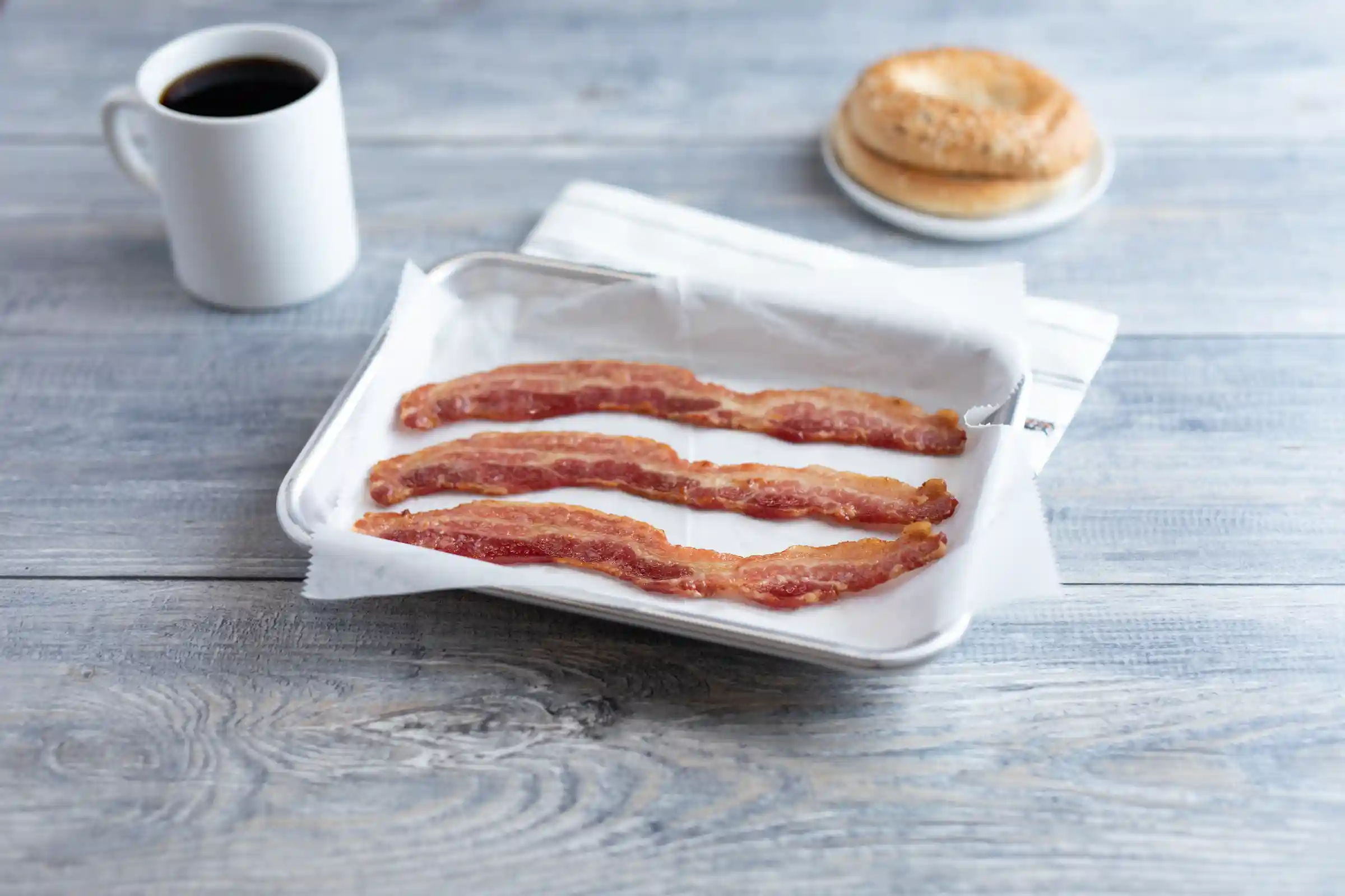 Wright® Brand Naturally Hickory Smoked Regular Sliced Bacon, Bulk, 15 Lbs, 10-14 Slices per Pound, Frozen https://images.salsify.com/image/upload/s--2j9SAPQO--/q_25/dbvmfst19pgxjnqlotfb.webp
