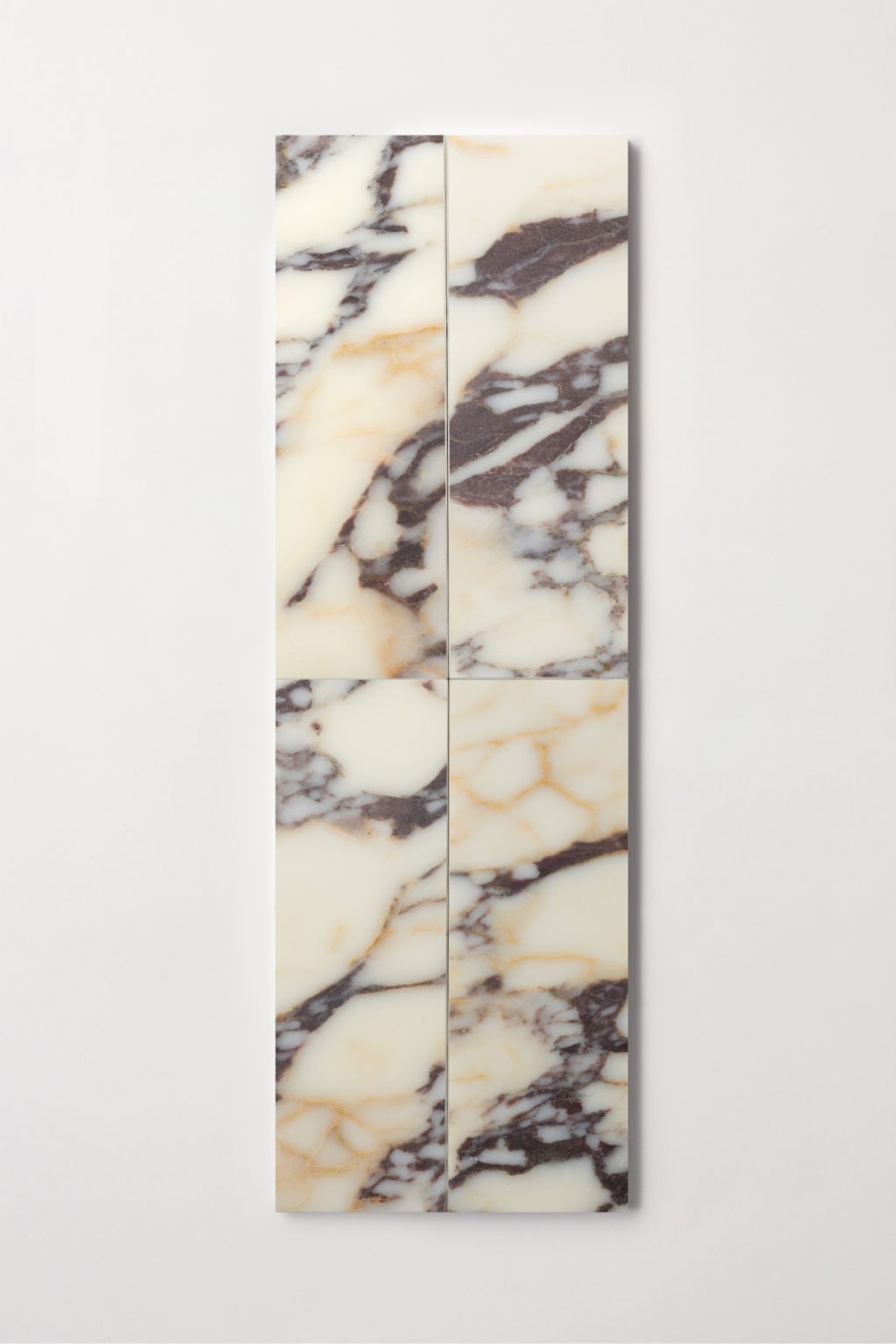 marble tiles arranged on a white surface.