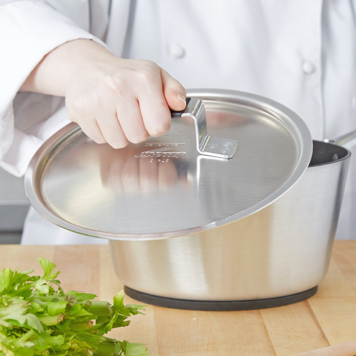 9 3/16-inch Wear-Ever® domed aluminum cover with satin finish and dipped handle