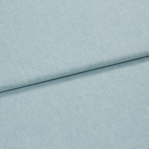 Light-blue linen-like fabric, folded once with an overlapping seam; textured weave visible. Close-up on a flat surface under soft, even studio lighting, neutral background.