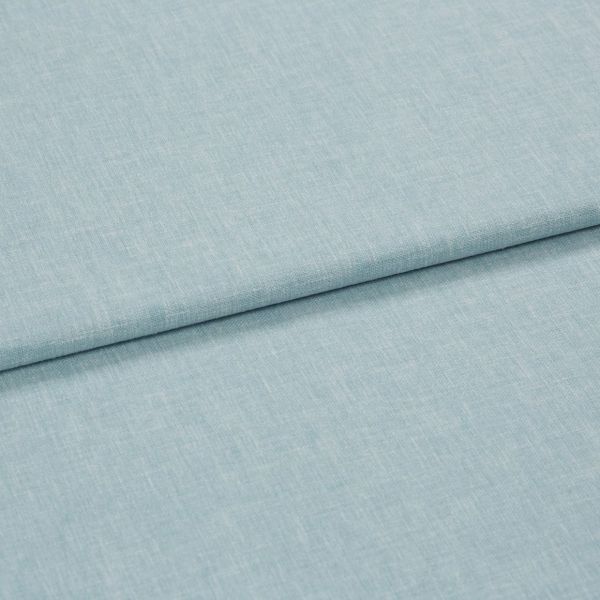 Light-blue linen-like fabric, folded once with an overlapping seam; textured weave visible. Close-up on a flat surface under soft, even studio lighting, neutral background.